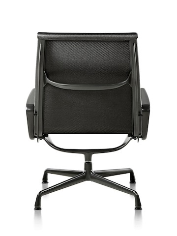 Rear view of an Eames Aluminum Group outdoor chair in a black weave fabric, showing the aluminum frame structure. Rear view of an Eames Aluminum Group outdoor chair in a black weave fabric, showing the aluminum frame structure.