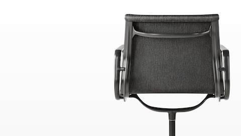 Rear view of a black Eames Aluminum Group outdoor chair, focusing on the proprietary Outdoor Weave fabric. Rear view of a black Eames Aluminum Group outdoor chair, focusing on the proprietary Outdoor Weave fabric.