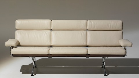 Ivory-colored Eames Sofa, viewed from the front. 