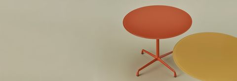 Detail shot of Eames Tables on sage background.