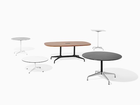 Five Eames Tables of various heights, top shapes, finishes, and base styles.