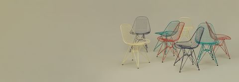 Eames Wire Chairs group shot on sage background. Eames Wire Chairs group shot on sage background.