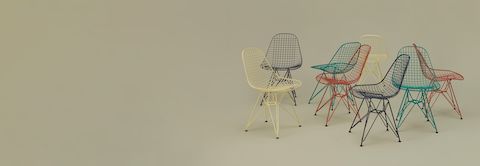 Group shot of Eames Wire Chairs on sage background