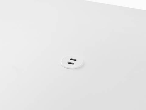 Surface-integrated dual port USB-C power solution shown in white.
