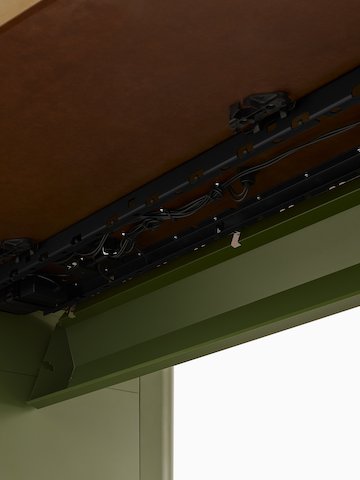 Headway Huddle Table with Ello Micro Vine and open wire management trough. Select to go to the Ello Micro Vine Power Access product page.