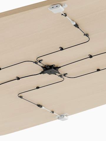 Headway Huddle Table with four Ello Mini Vines undermounted. Select to go to the Ello Mini Vine Power Access product page.