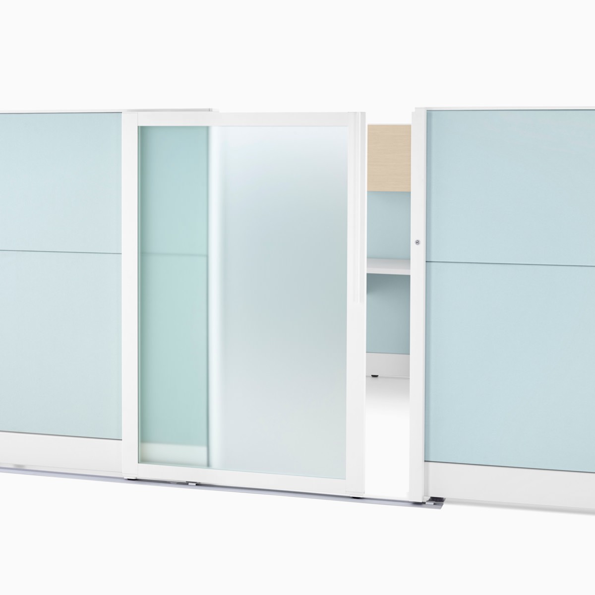 An Ethospace wall system in a light aqua finish with a translucent sliding privacy door.