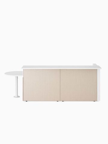 Ethospace Nurses Station in a light wood finish with transaction surface and ADA peninsula surface in white.