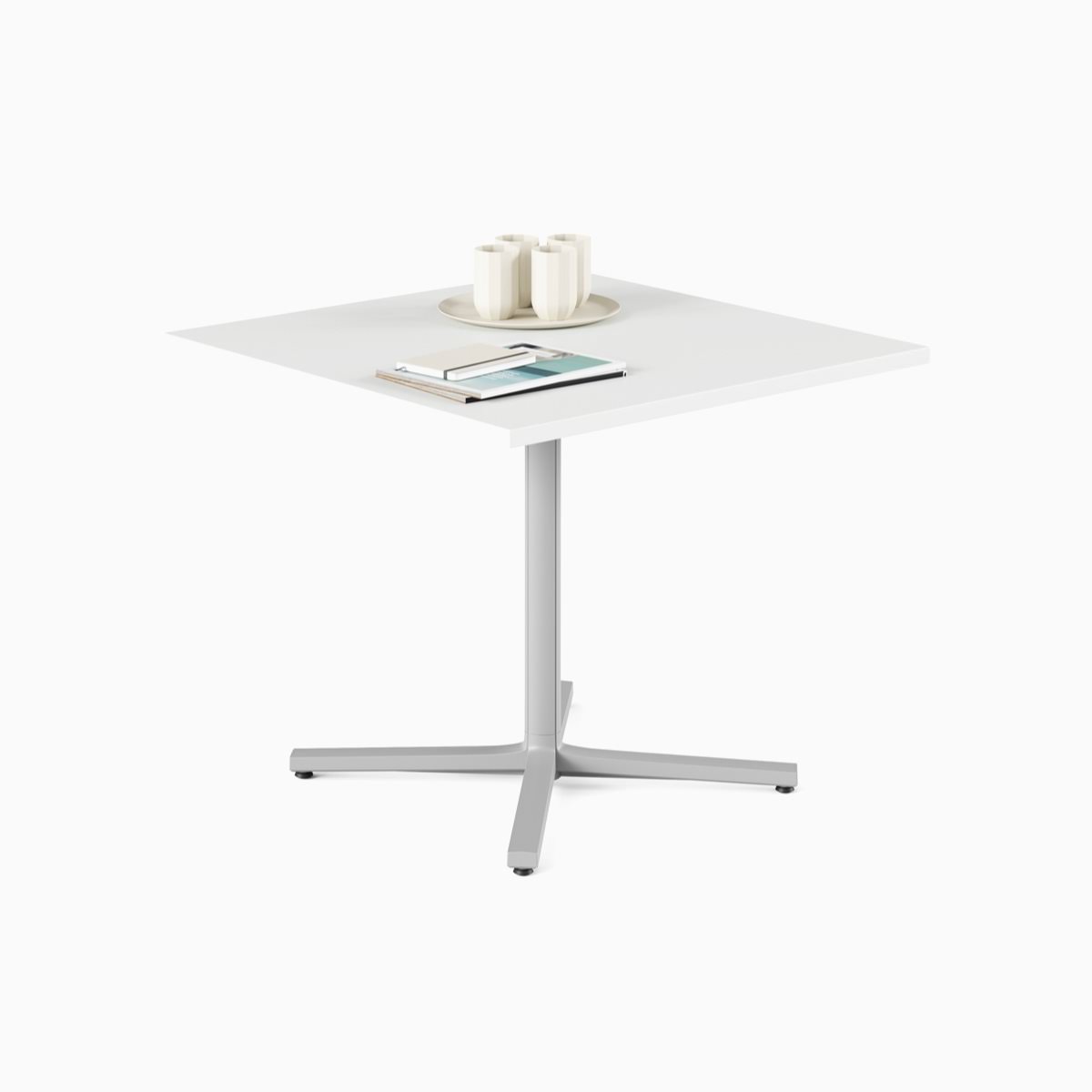 A white, square, standard height Everywhere Table with a grey column.