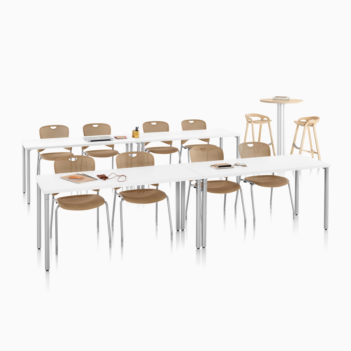 A classroom setting with two rows of Everywhere Tables with white tops and silver base and tan Caper Stacking Chairs.