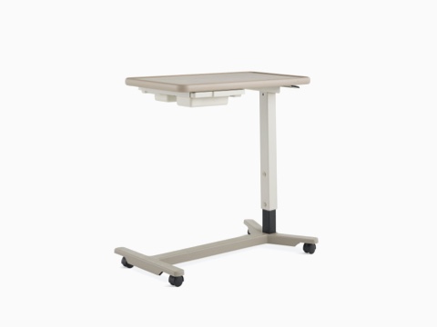 Angled view of EZ-123 Overbed Table with folkstone grey laminate top, pewter urethane edge, ash gray column, and titanium base.