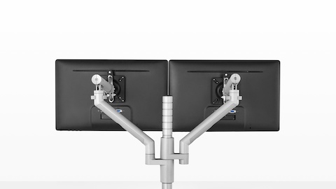 Vista posteriore di due monitor collegati a un braccio per monitor Flo Modular.