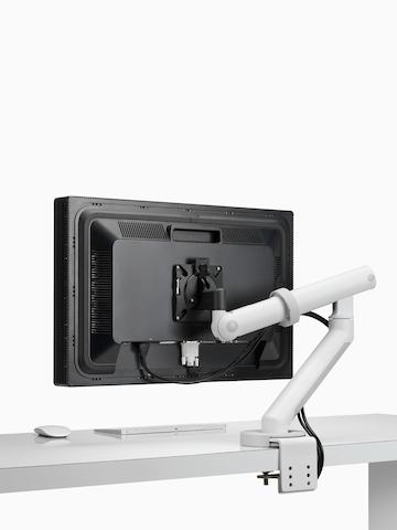 A single monitor supported by a heavy-duty version of the Flo Monitor Arm. Select to go to the Flo Plus Single product page.