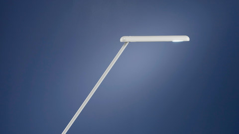 The lamp head of a white Flute Personal Light.