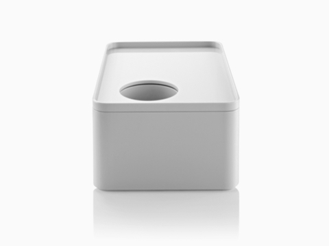 Una grande scatola Formwork bianca con coperchio rimovibile e tazza rimovibile.
