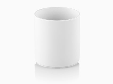 A white Formwork Round Pencil Cup. A white Formwork Round Pencil Cup.