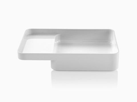 Profile view of the large version of a white Formwork Tray with a deep rear compartment and cantilevered front compartment. Profile view of the large version of a white Formwork Tray with a deep rear compartment and cantilevered front compartment.