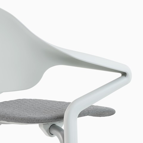 A close-up detail of the tubular arm of a Fuld Nesting Chair. A close-up detail of the tubular arm of a Fuld Nesting Chair.