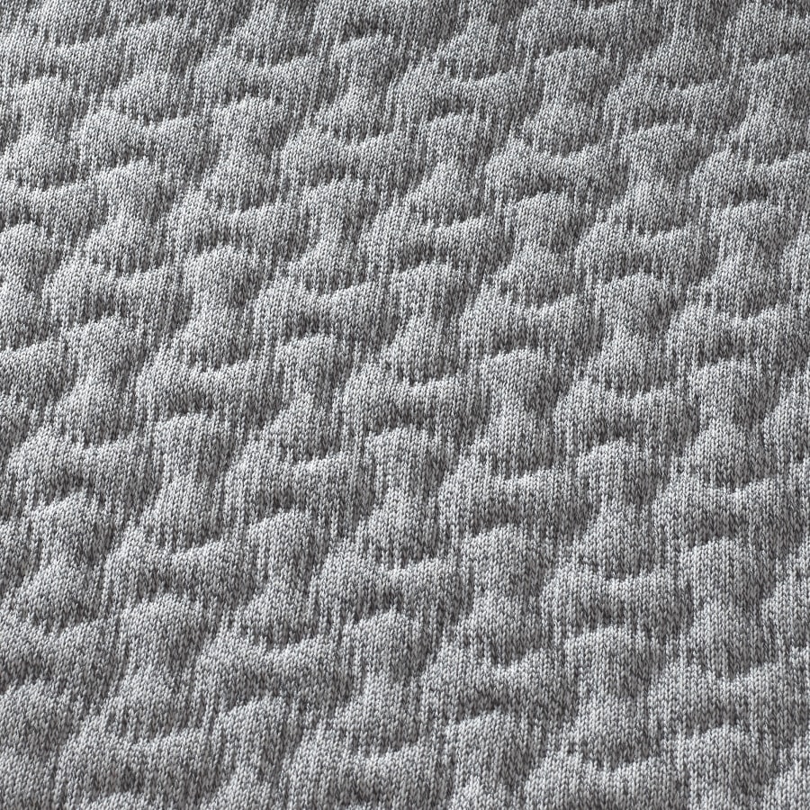 Eine Detail-Nahaufnahme von Tuck, dem optionalen 3D-Knit Material für Fuld Stühle.