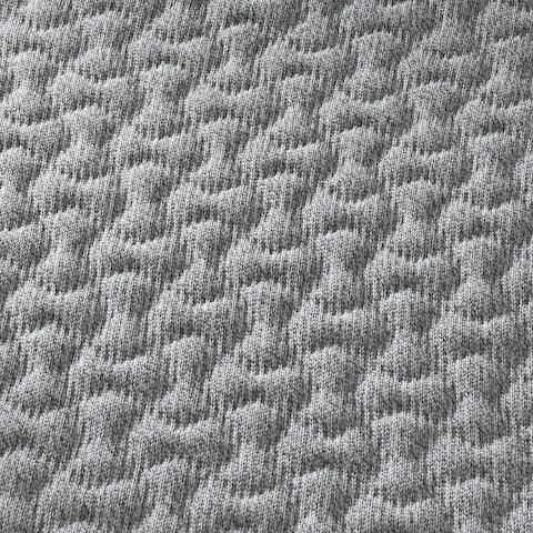 A close-up detail of Tuck, the optional 3D Knit textile for Fuld Nesting Chairs.