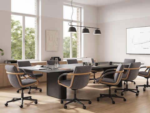 Full Loop office chairs around an Axon Conference Table in a conference room setting.