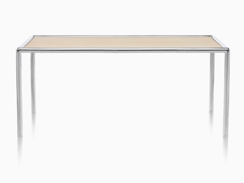A rectangular Full Round Table with a tan top and tubular metal frame. A rectangular Full Round Table with a tan top and tubular metal frame.