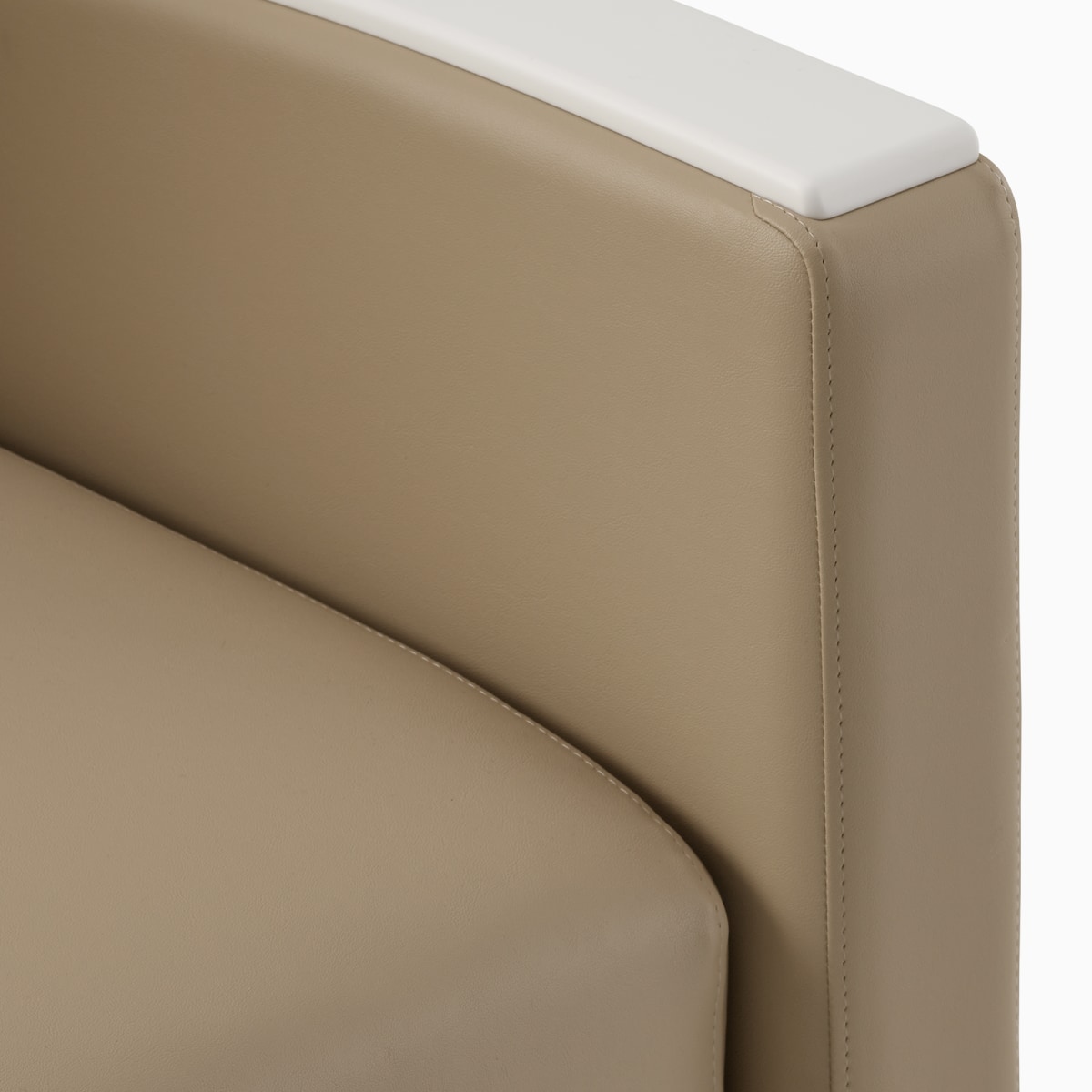 Detail showing armrest and seat cushion for easy clean-out on Gemma Sleep Settee. 
