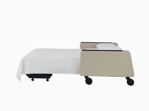 Gemma Sleep Settee, dressed with bedding in sleeping position.