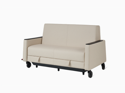Gemma Sleep Settee viewed from an angle in seated position.