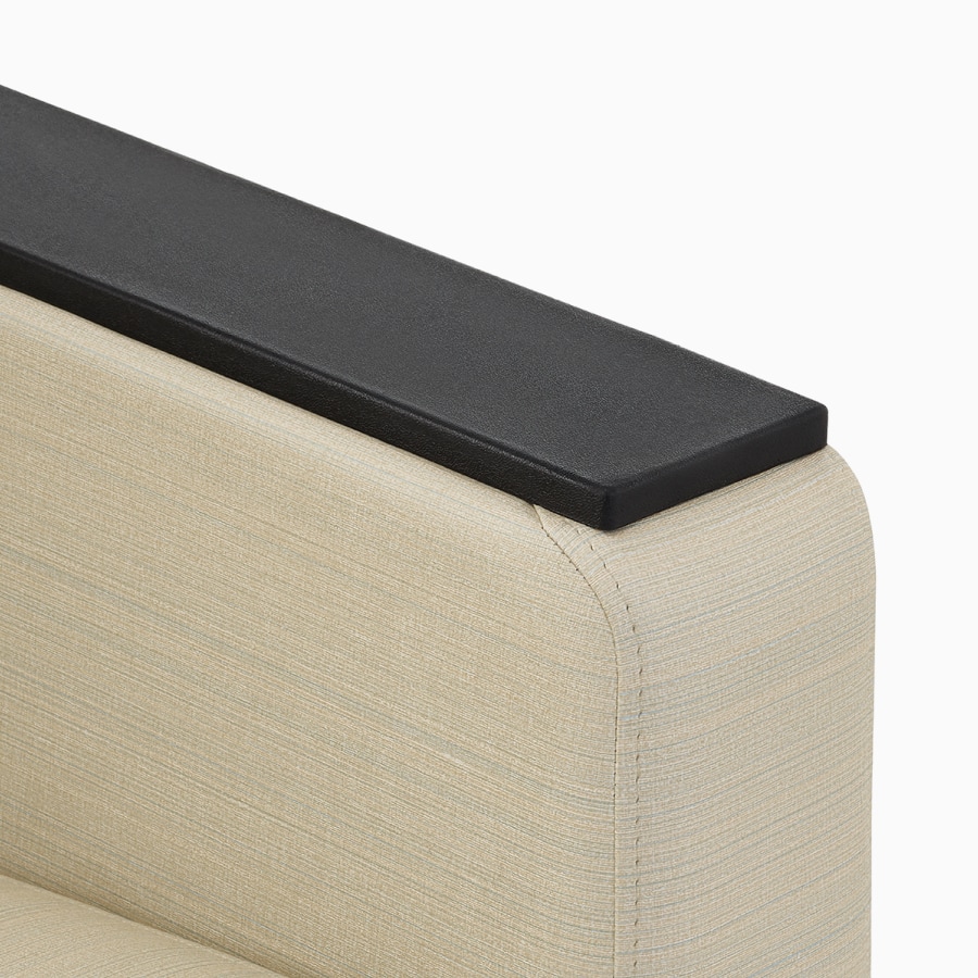Detailed view of black urethane arm cap. 