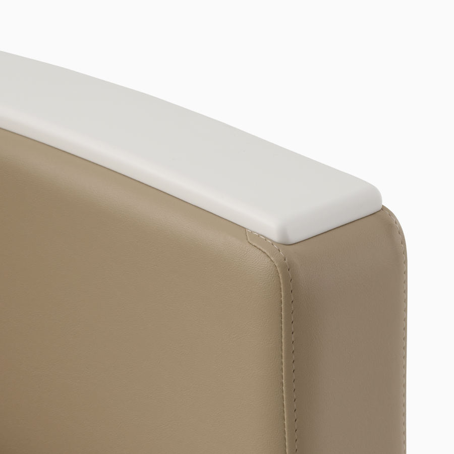 Detailed view of white arm cap. 