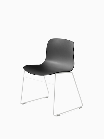 Black About A Chair with sled base, viewed at an angle.