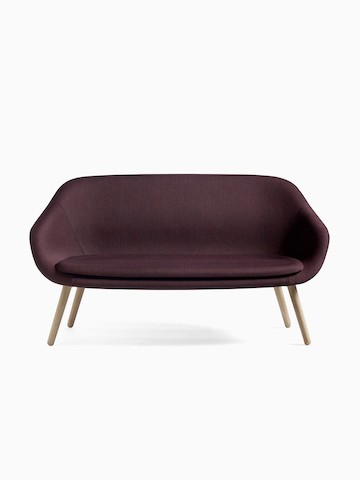A front view of the About A Lounge Sofa in maroon. Select to go to the About A Lounge Sofa product page.