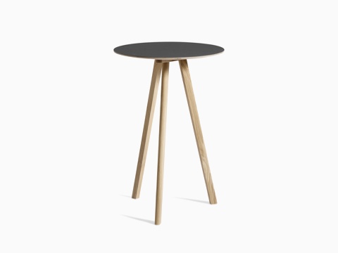 Black Copenhague Bistro Table with wooden legs, viewed at an angle. Black Copenhague Bistro Table with wooden legs, viewed at an angle.