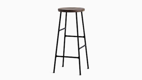 A Cornet Barstool with a smoked oak seat and black base.
