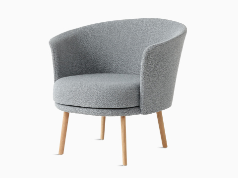 A front angle view of the Dorso Lounge Chair with grey seat and back, and oak legs. A front angle view of the Dorso Lounge Chair with grey seat and back, and oak legs.