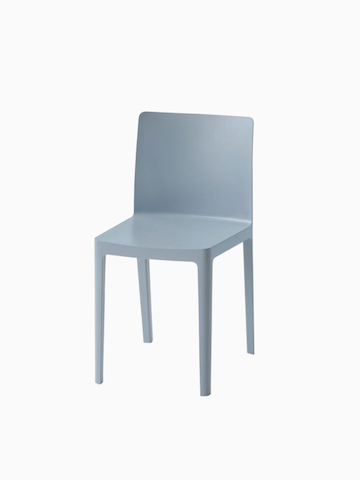 A front angle view of the Élémentaire Chair in blue-grey. Select to go to the Élémentaire Chair product page.