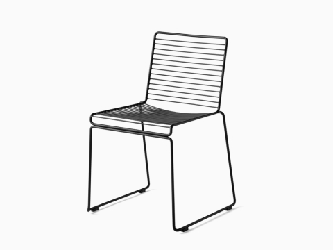 A front angle view of the Hee Dining Chair in black. A front angle view of the Hee Dining Chair in black.