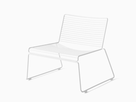 A front angle view of the Hee Lounge Chair in white. A front angle view of the Hee Lounge Chair in white.