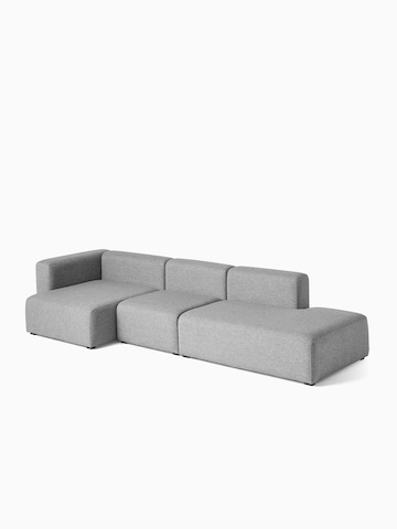 A gray Mags Sectional Sofa, viewed at an angle. Select to go to the Mags Sectional Sofas product page.