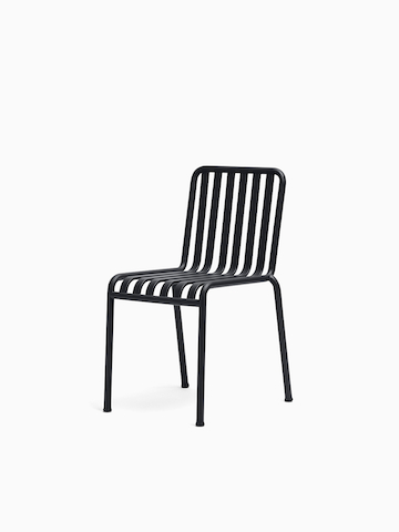 Three quarter view of a Palissade Chair without arms in dark gray.