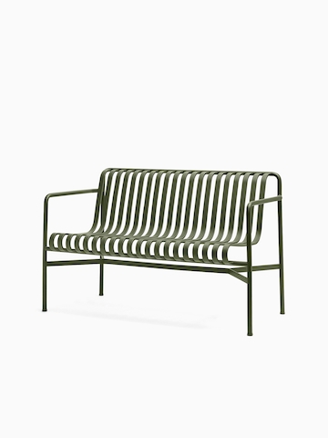 Three quarter front view of a Palissade Dining Bench in olive green. Select to go to the Palissade Dining Bench product page.