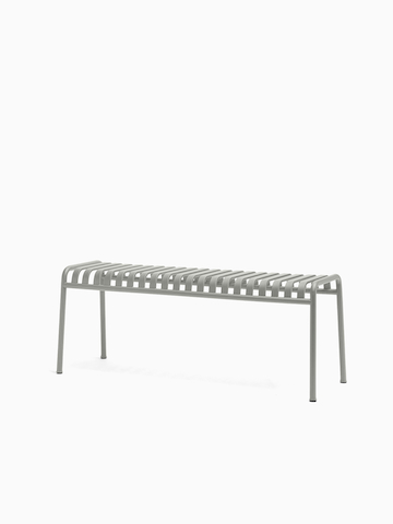 Three quarter view of a Palissade Bench in grey.