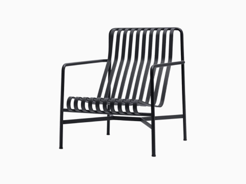 A three quarter view of a Palissade Lounge Chair, High in dark grey.