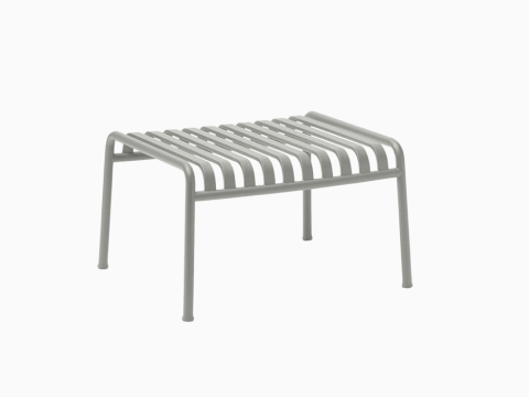 A Palissade Ottoman in light grey. A Palissade Ottoman in light grey.