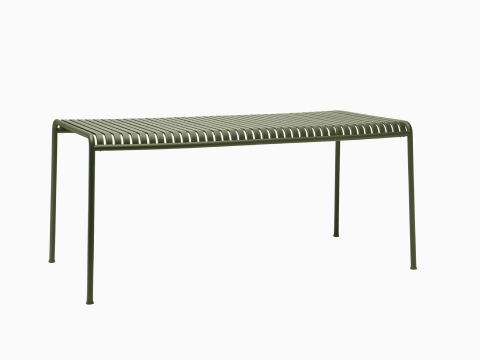 A Palissade Dining Table in olive green. A Palissade Dining Table in olive green.