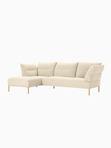 A front angled view of the Pandarine Sectional Sofa with right chaise in cream.