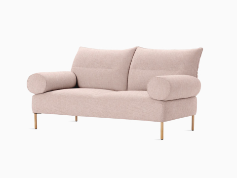 A front angle view of the Pandarine 2-seat sofa in light pink.