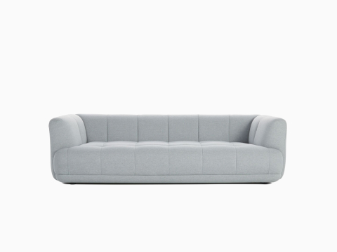 A front view of the Quilton Sofa in gray. A front view of the Quilton Sofa in gray.