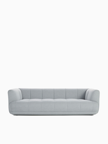A front view of the Quilton Sofa in gray.